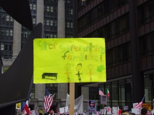 handmade sign at the May Day rally
