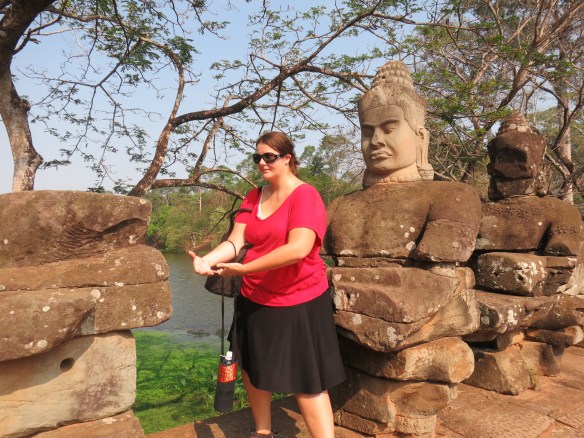 Holding up the snake