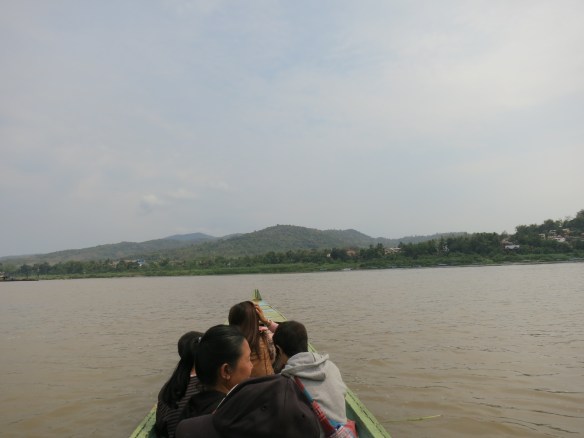 A tiny boat on a huge river