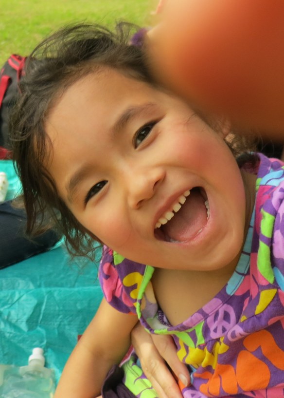 Carmen's grabbing for the camera and her thumb's in the way