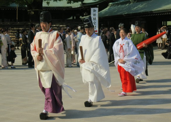 Everyone quieted down in respect for the passing wedding party