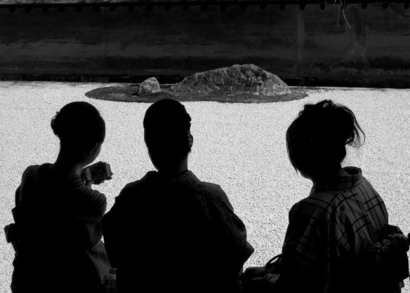 Teenagers in traditional dress, taking a selfie