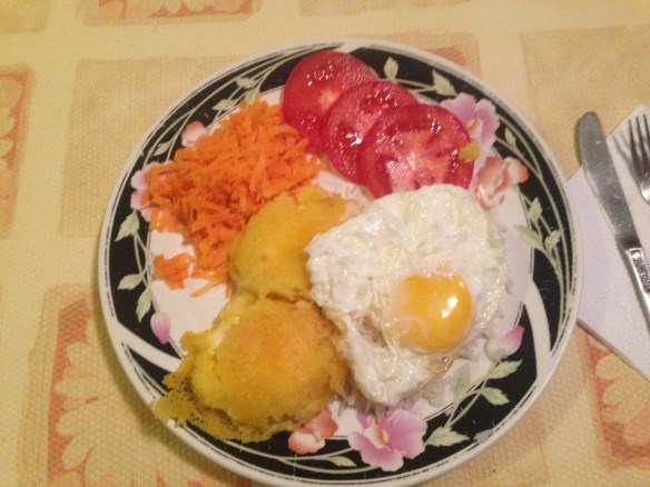 Llapingachos, arroz, huevo frita