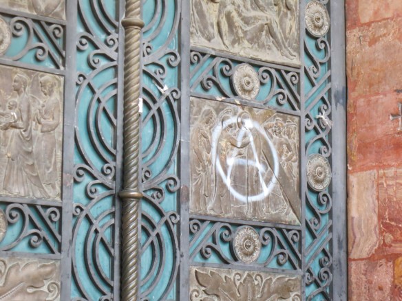 Anarchy symbol on the main church door